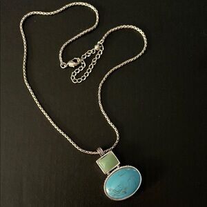 Elegant Silver and Turquoise Pendant Necklace
